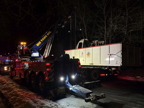 Heavy tow truck transporting FireBox